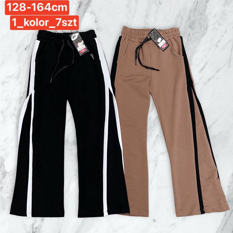 Spodnie dziewczęcy. Roz 128-164. 1 kolor Paczka 7 szt . 1
