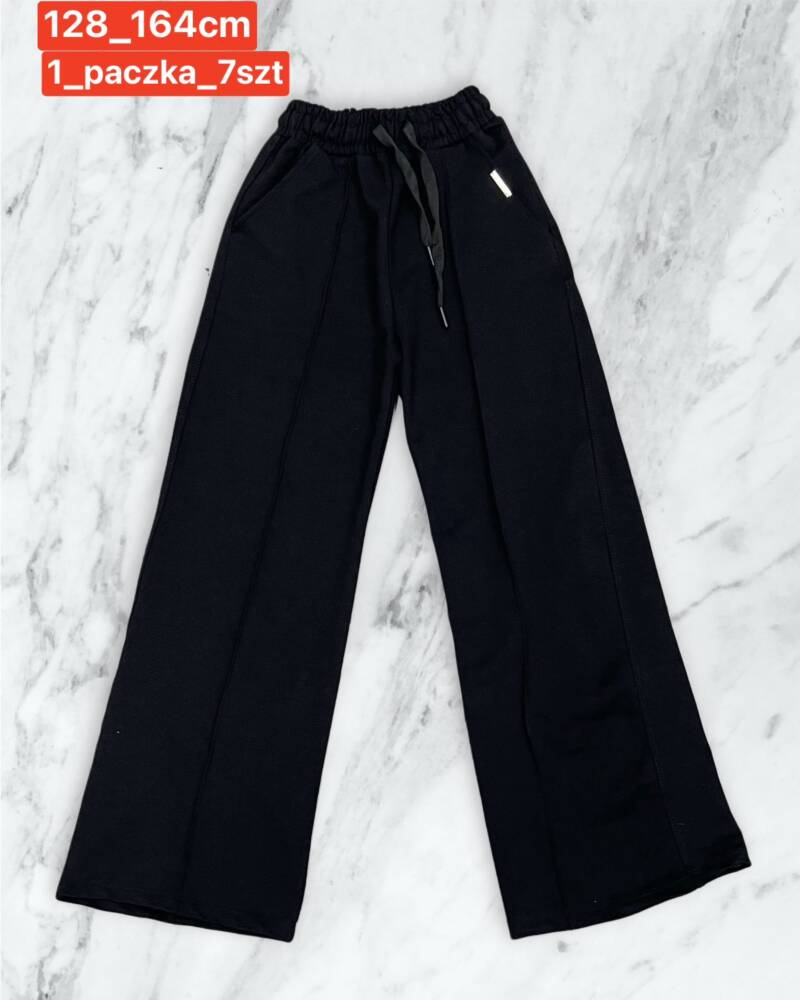 Spodnie dziewczęcy. Roz 128-164. 1 kolor Paczka 7 szt . 1