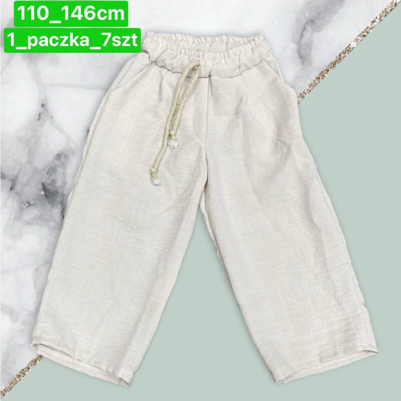 Spodnie dziewczęcy. Roz 110-146. 1 kolor Paczka 7 szt . 1