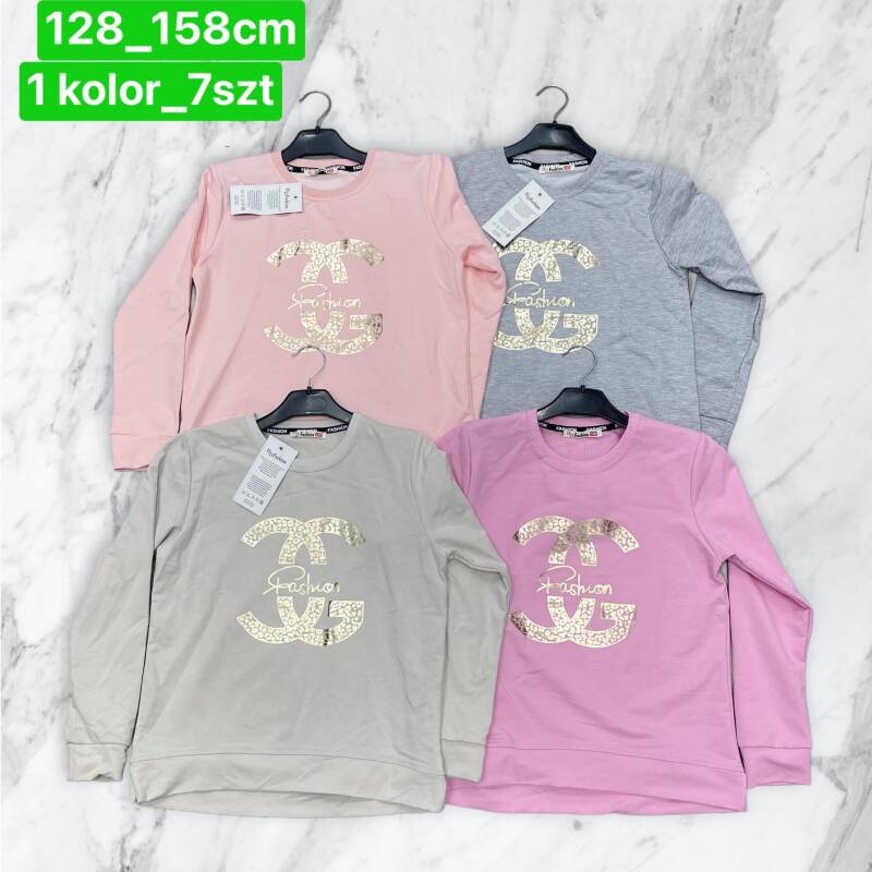 Bluzka dziewczęcy. Roz 128-158. 1 Kolor Paczka 7 szt 1