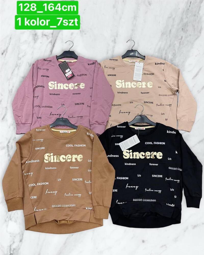 Bluzka dziewczęcy. Roz 128-164. 1 Kolor Paczka 7 szt