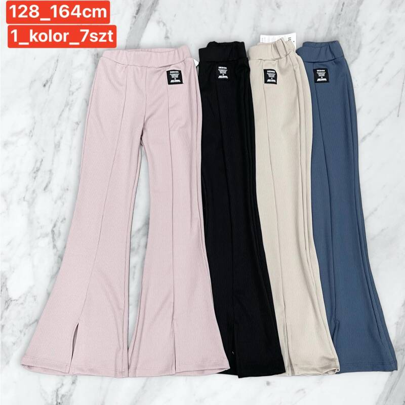 Spodnie dziewczęcy. Roz 128-164. 1 kolor Paczka 7 szt . 1